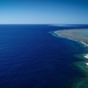 Research vessel Falkor near the site of the newly detected detached reef.